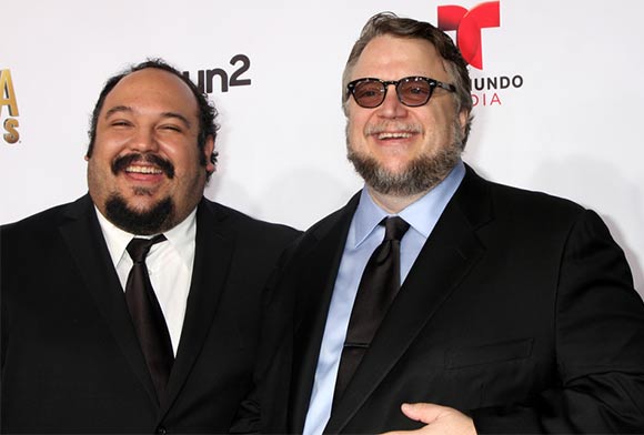 Jorge Gutierrez (left) with "Book of Life" producer Guillermo del Toro a the American Latino Media Arts Award, October 2014. (Photo by Helga Esteb/Shutterstock.)