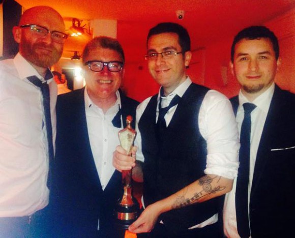 Celebrating their win (l. to r.): Song of the Sea producer Paul Young, unidentified, director Tomm Moore, writer Will Collins.