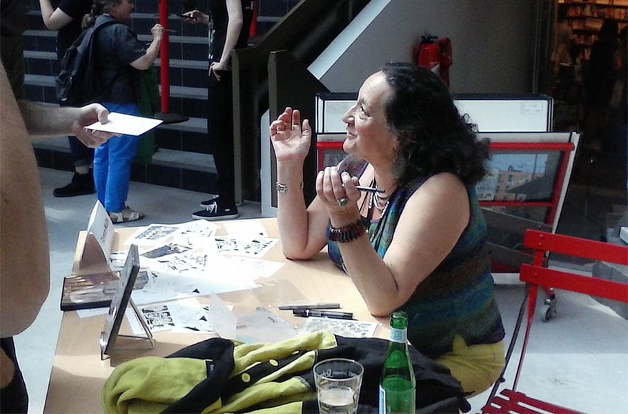 Florence Miailhe signing at Annecy. Click to enlarge. (Photo by Tess Martin.)