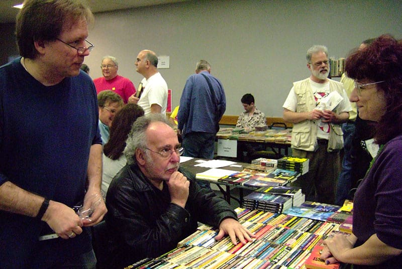 Connor Cochran (l.) and Peter Beagle (middle) at a book show in 2007. (Photo: Beth Hillman)