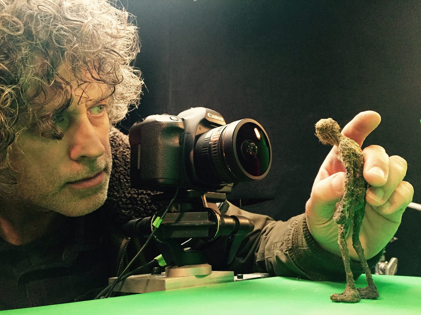 A Tippett Studio employee photographing a creature for Hologrid.