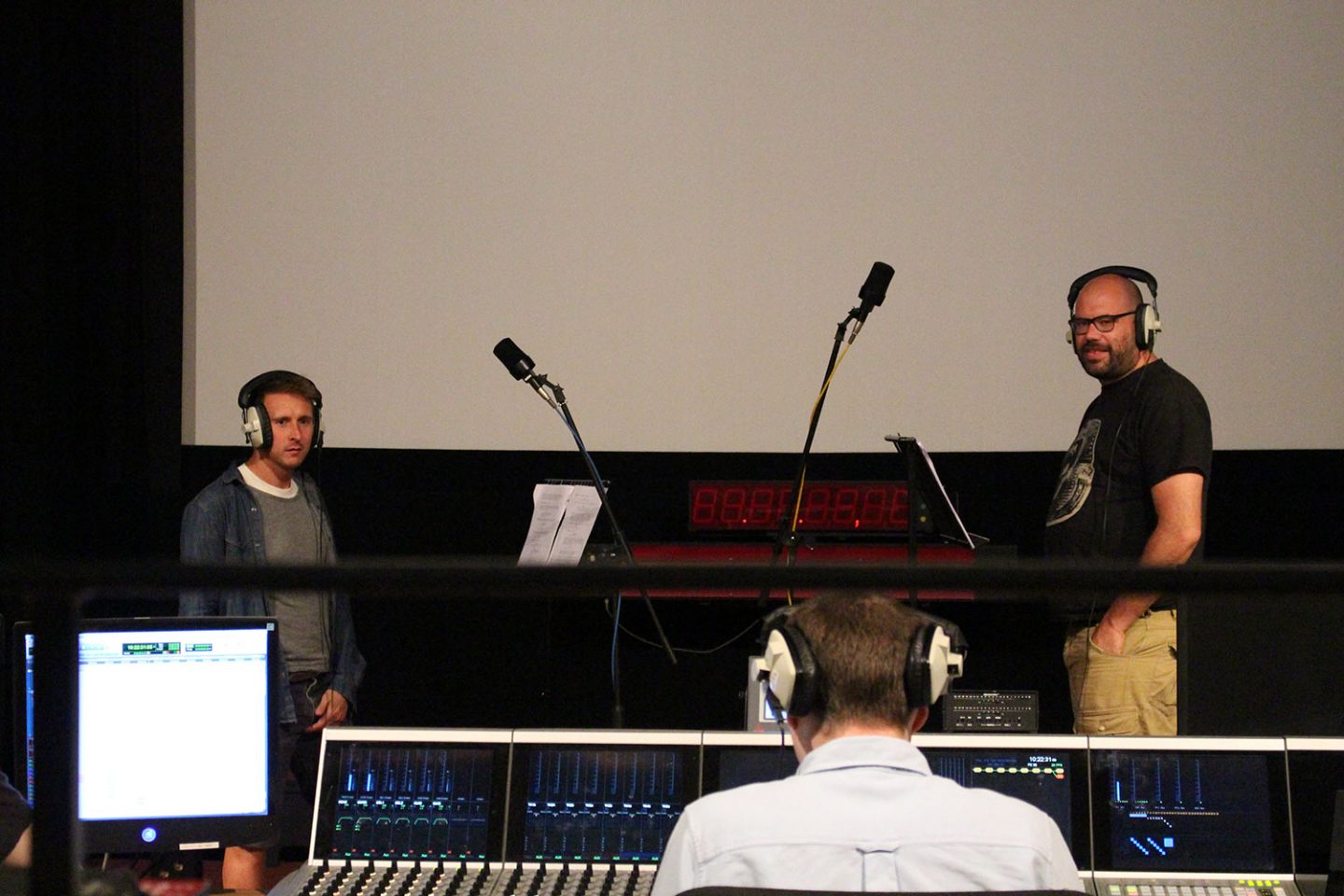Voice actors Peter Caulfield (left) and Tom Davis during a recording session.
