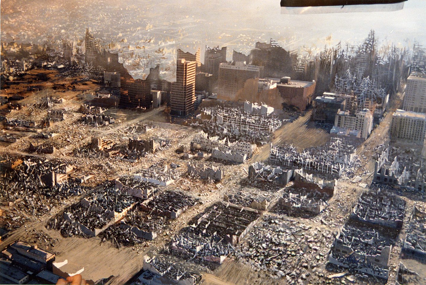 The matte painting of the destroyed LA scene by Rick Kilroy and Rick Riche. Robert Skotak himself made some minor touches to the painting with atmospheric overlays and highlights.
