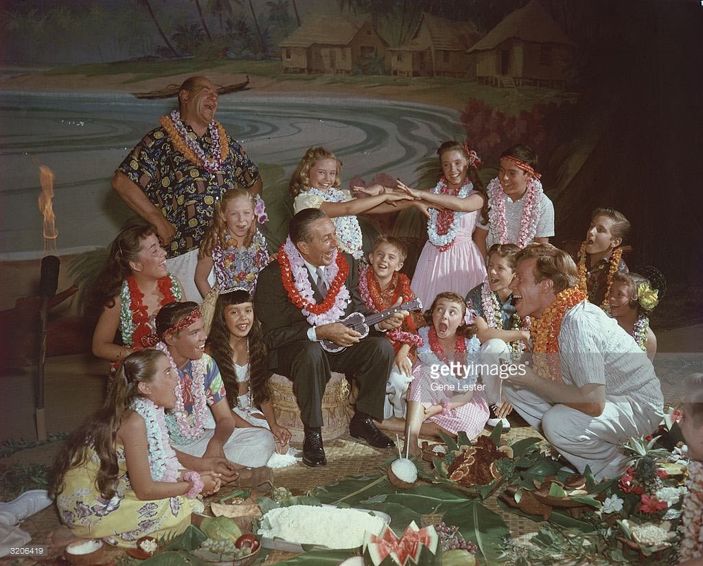 Walt Disney with Mouseketeers, Jimmie Dodd, and Roy Williams (background).