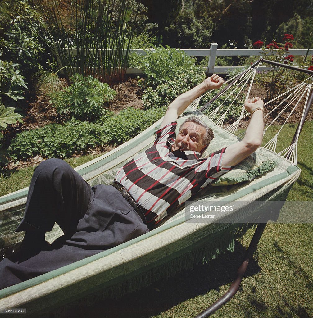 Walt Disney relaxing at home.