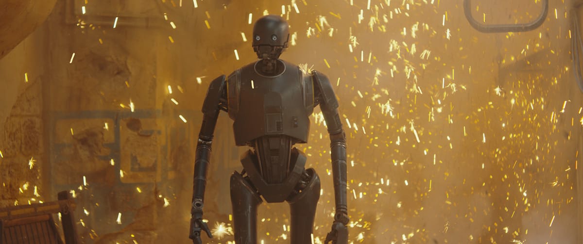 K-2 features in this scene where he nonchalantly dispatches a group of troopers with a live grenade.
