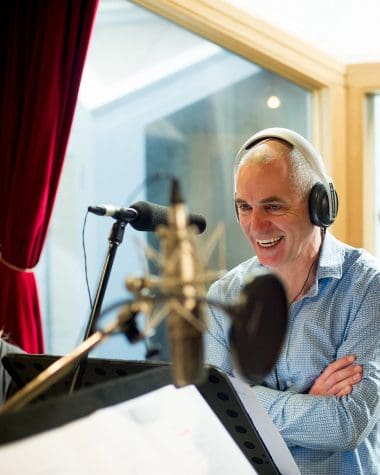 Rob Sitch during a voice recording session. Photo credit: Hwa Goh. Image © Pacific Heat TV Pty Ltd.