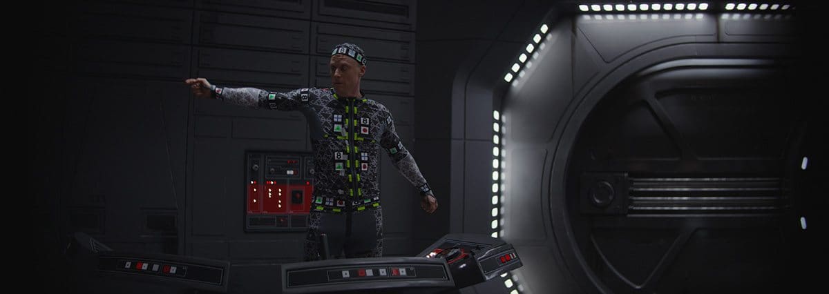 Alan Tudyk performs in a capture suit on set.