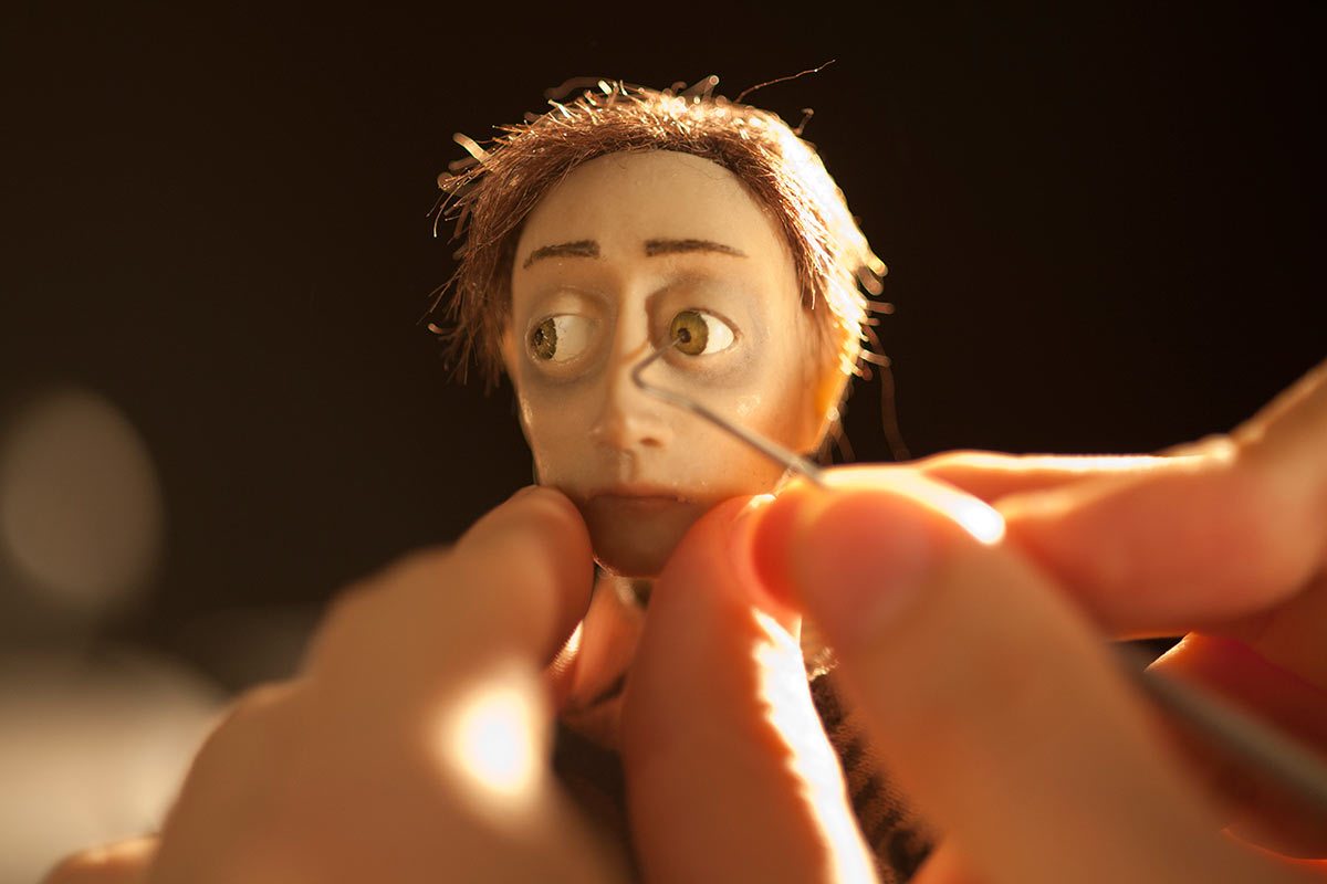 An animator moving a character's eye during the production of "Boles."