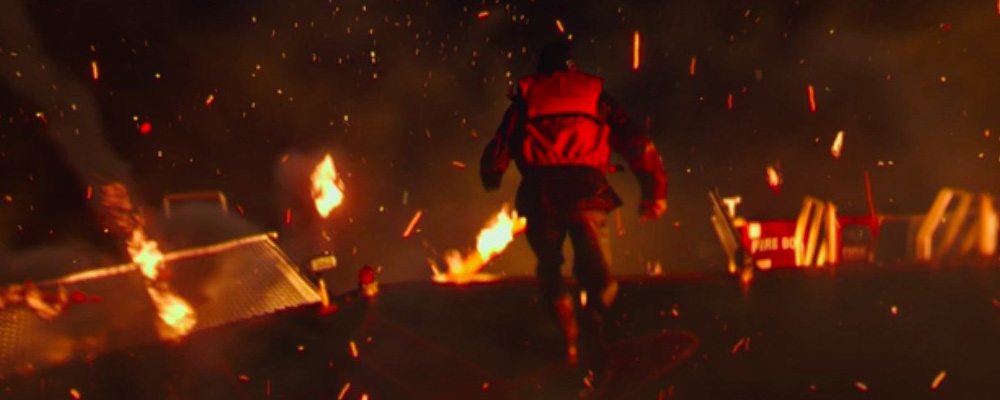 In the first of three screenshots from the trailer for Deepwater Horizon, Mike Williams (Mark Wahlberg) makes a leap for safety from the burning platform.