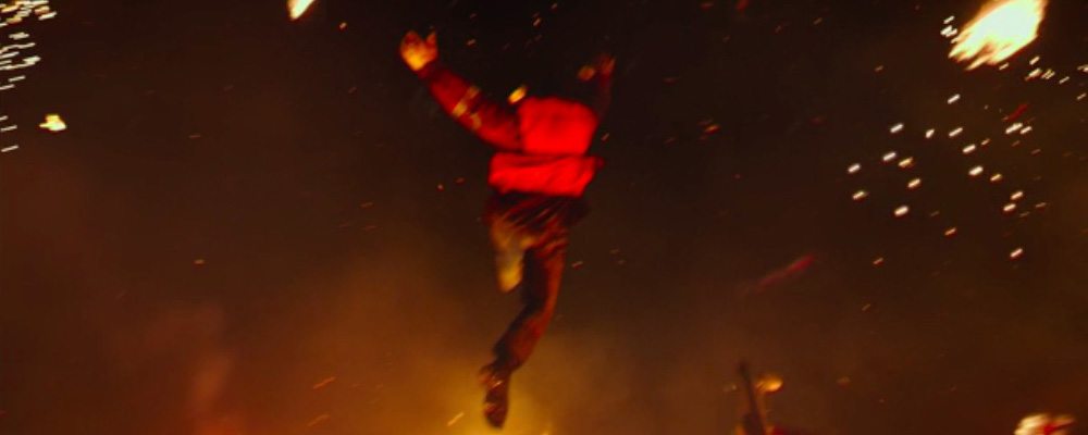 A real stunt was filmed of the leap, but ILM extensively added fire and water elements.