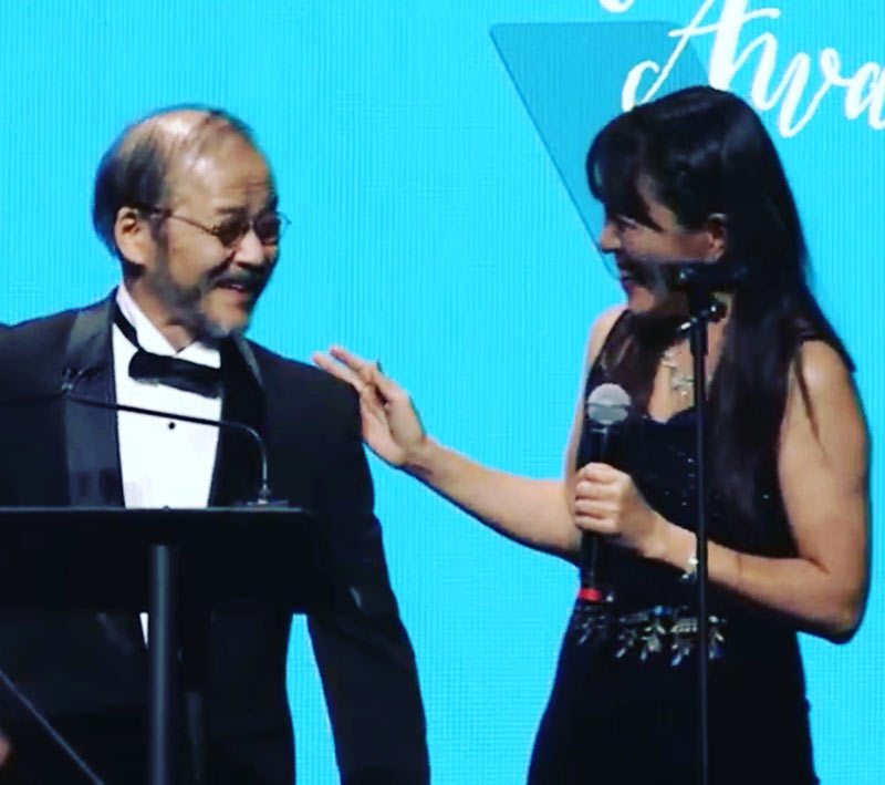 Maki Terashima-Furuta with Mamoru Oshii at the 2017 Annie Awards.