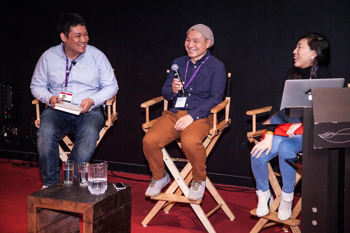 Moderator Nobuaki Doi (l.) speaks with Science Saru founders Masaaki Yuasa and Eunyoung Choi.