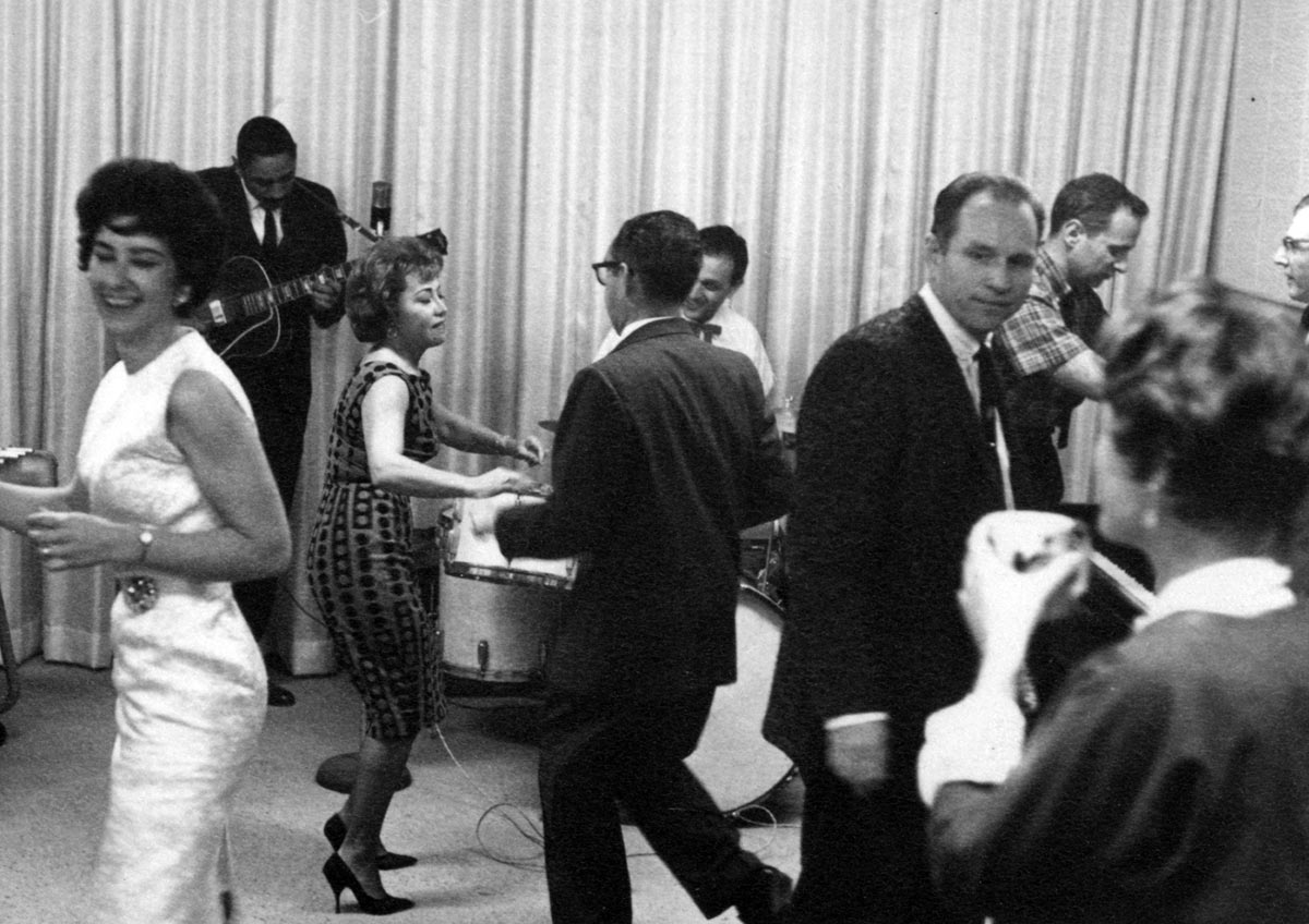 June Foray dancing (center) at a Format Films holiday party, ca. early-1960s.