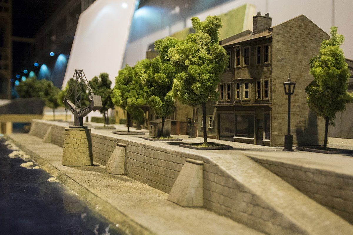 Miniature models are also used to represent pre-war cities and towns.