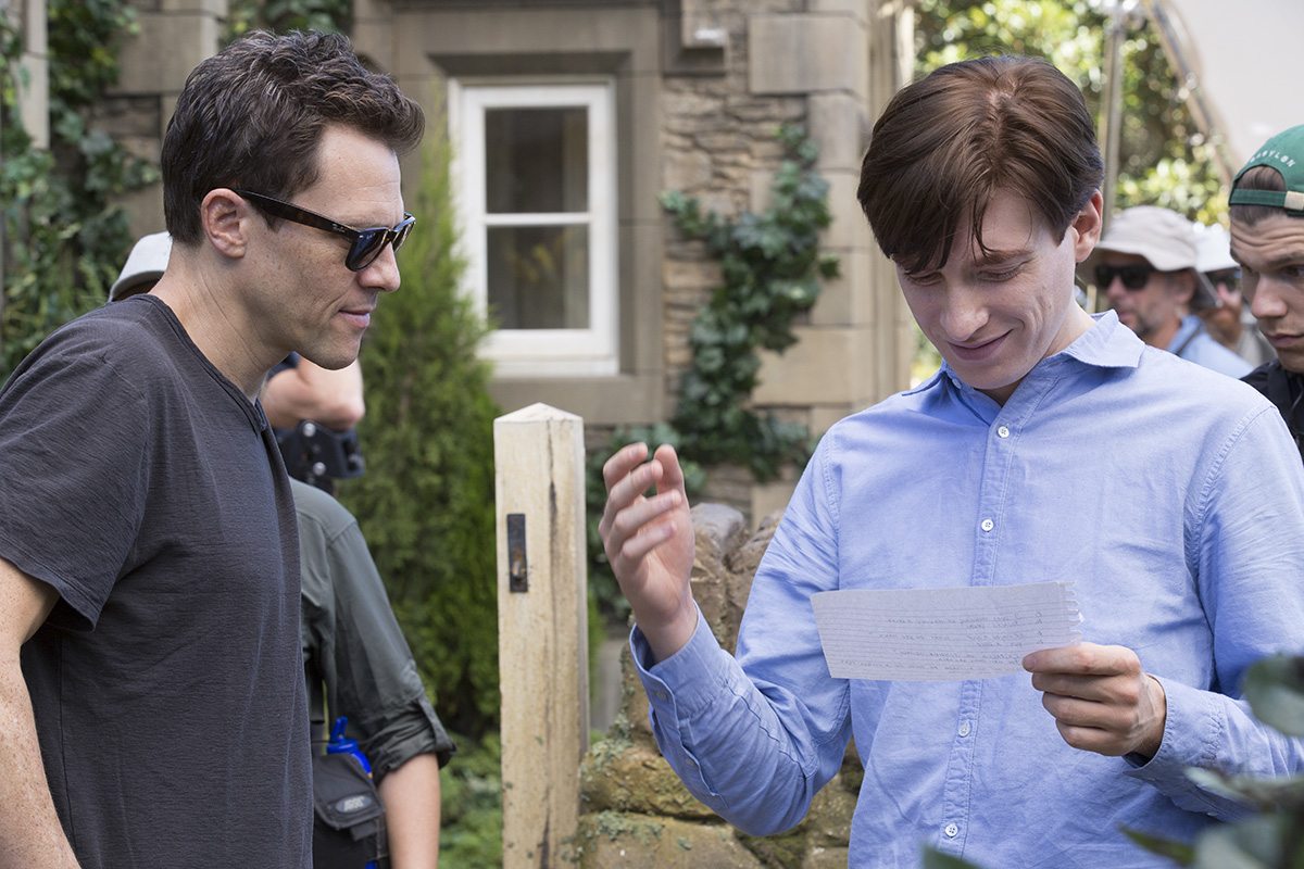 Director Will Gluck (left) with Domhnall Gleeson on the set of "Peter Rabbit."