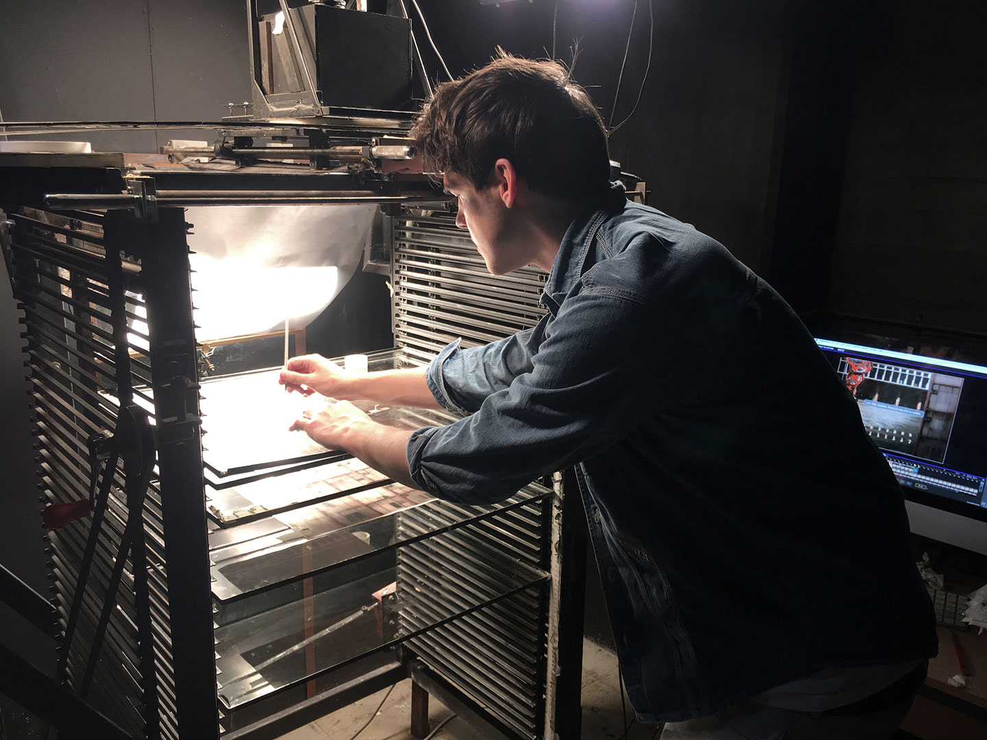 Filmmaker Ollie Magee at work on the multiplane.