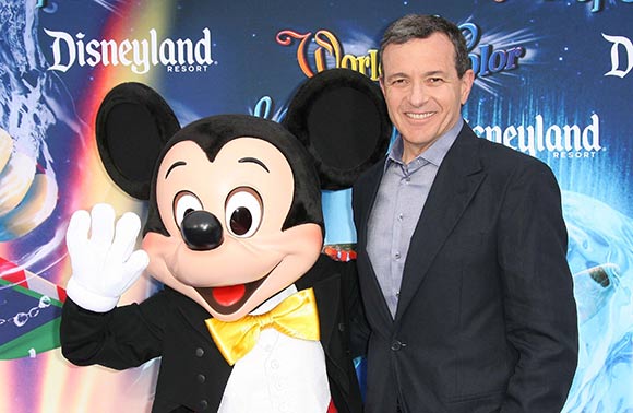 Bob Iger and Mickey Mouse. (Photo via Shutterstock.)