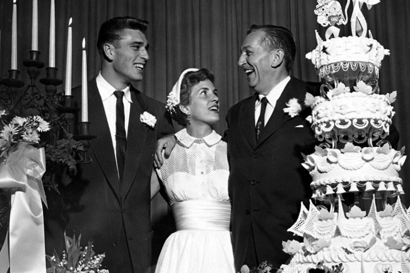 Walt Disney celebrates the wedding of his daughter Diane and Ron Miller in 1954.