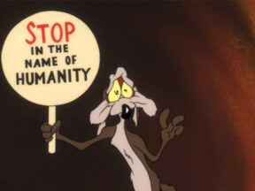 Wile E. Coyote holding sign